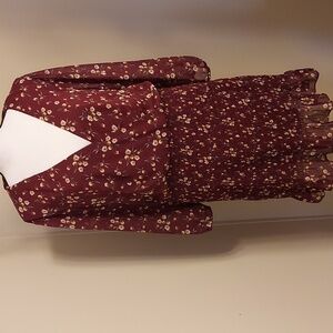 Floral smocked surplice mini dress by Trixxi